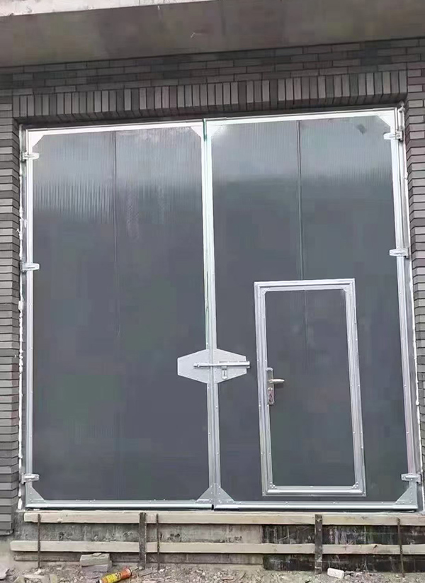 哈密工业平开门在大型设备制造车间的应用实例